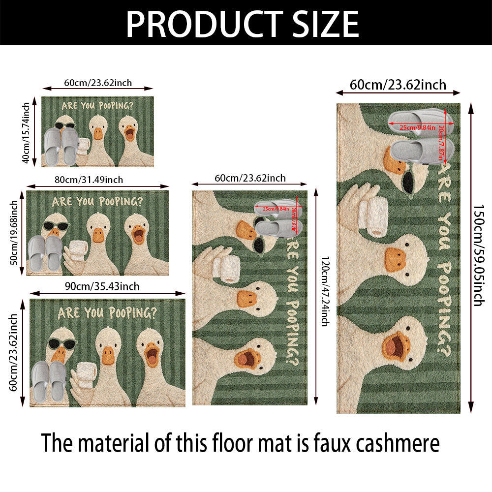 Tapis de salle de bain trois canards sur rayures