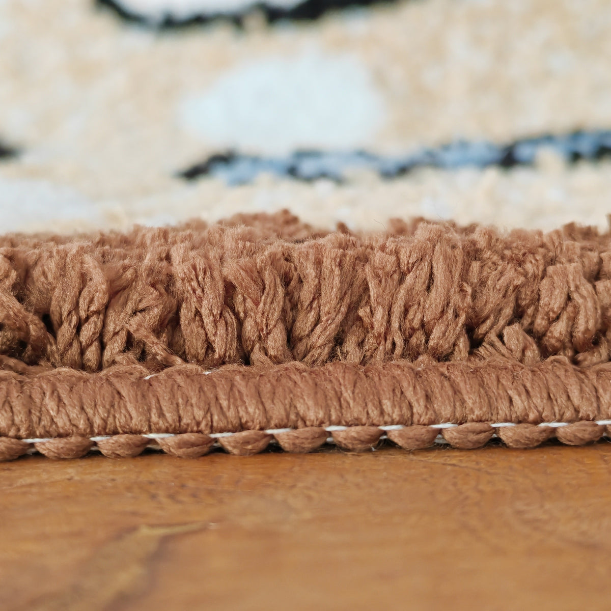 Tapis de salle de bain coquillages tuftés en relief
