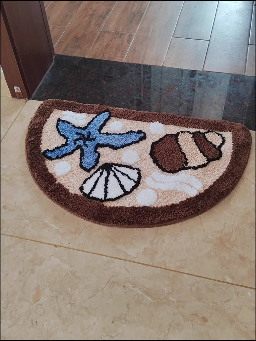 Tapis de salle de bain coquillages tuftés en relief