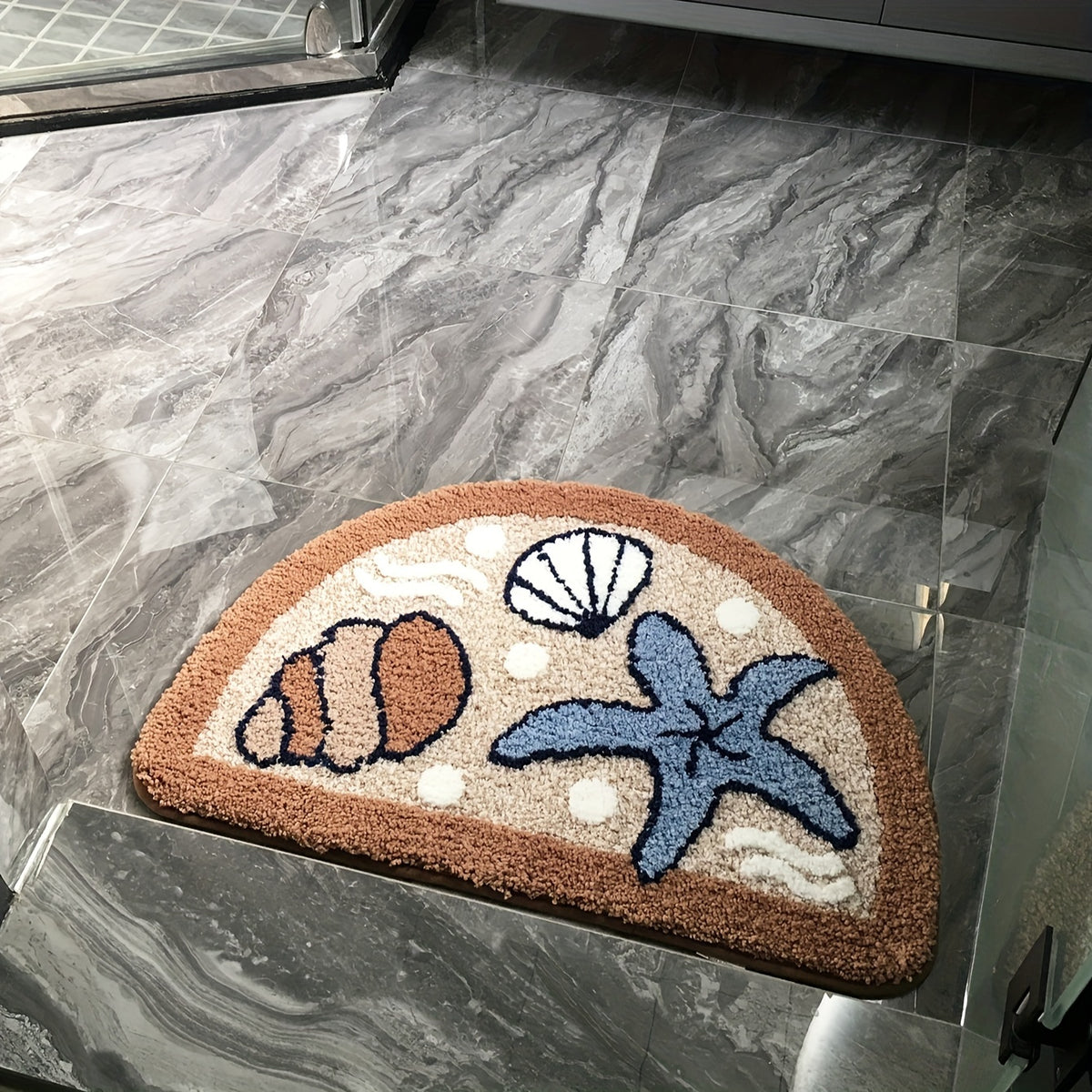 Tapis de salle de bain coquillages tuftés en relief