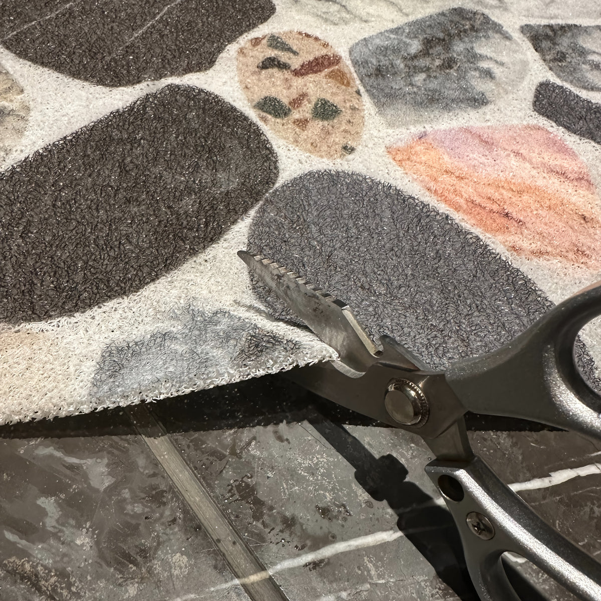 Tapis de salle de bain à galets de marbre