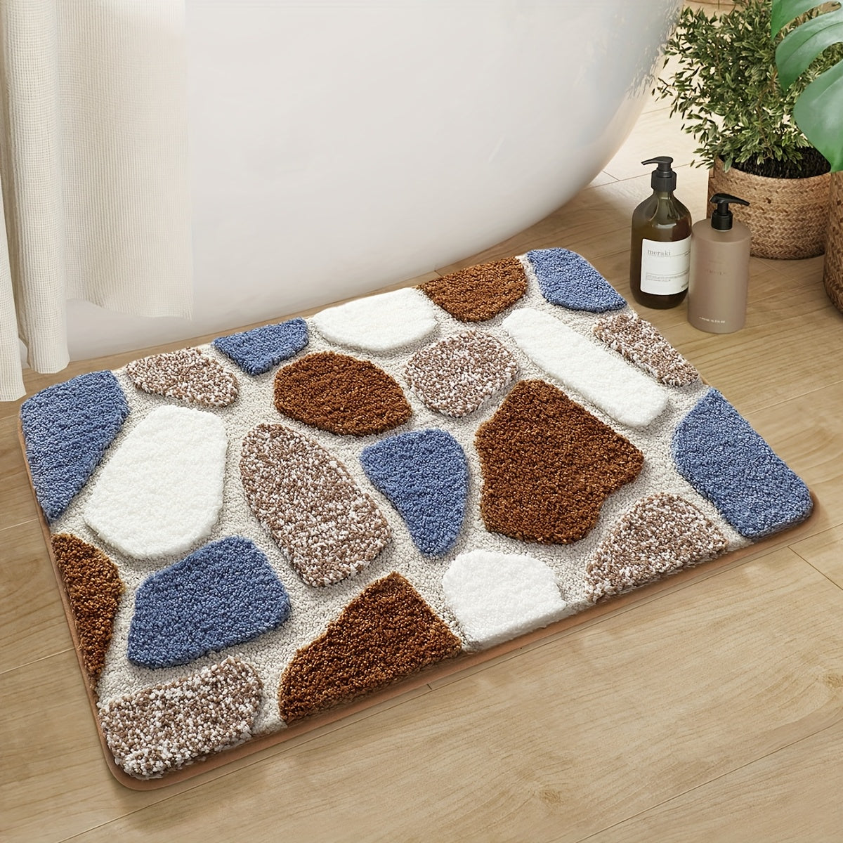 Tapis de salle de bain effet galets, relief tufté épais