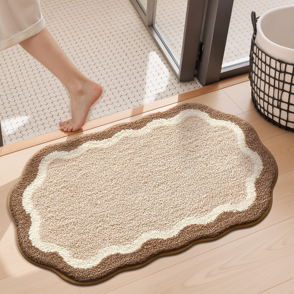 Tapis de salle de bain ovale à contour festonné