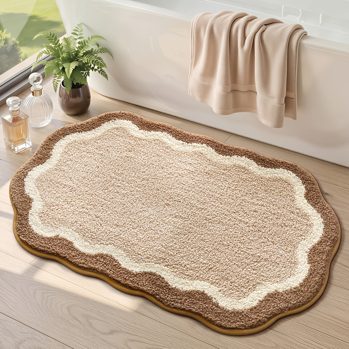Tapis de salle de bain ovale à contour festonné
